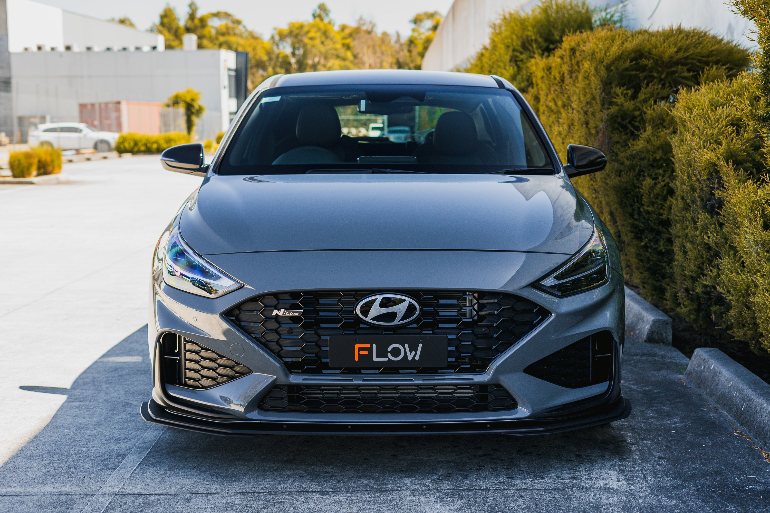 FLOW Designs  i30N-Line Hatch PDe.V6 FL 2024+ Front Lip Splitter & Reinforcement Brackets - MODE Auto Concepts
