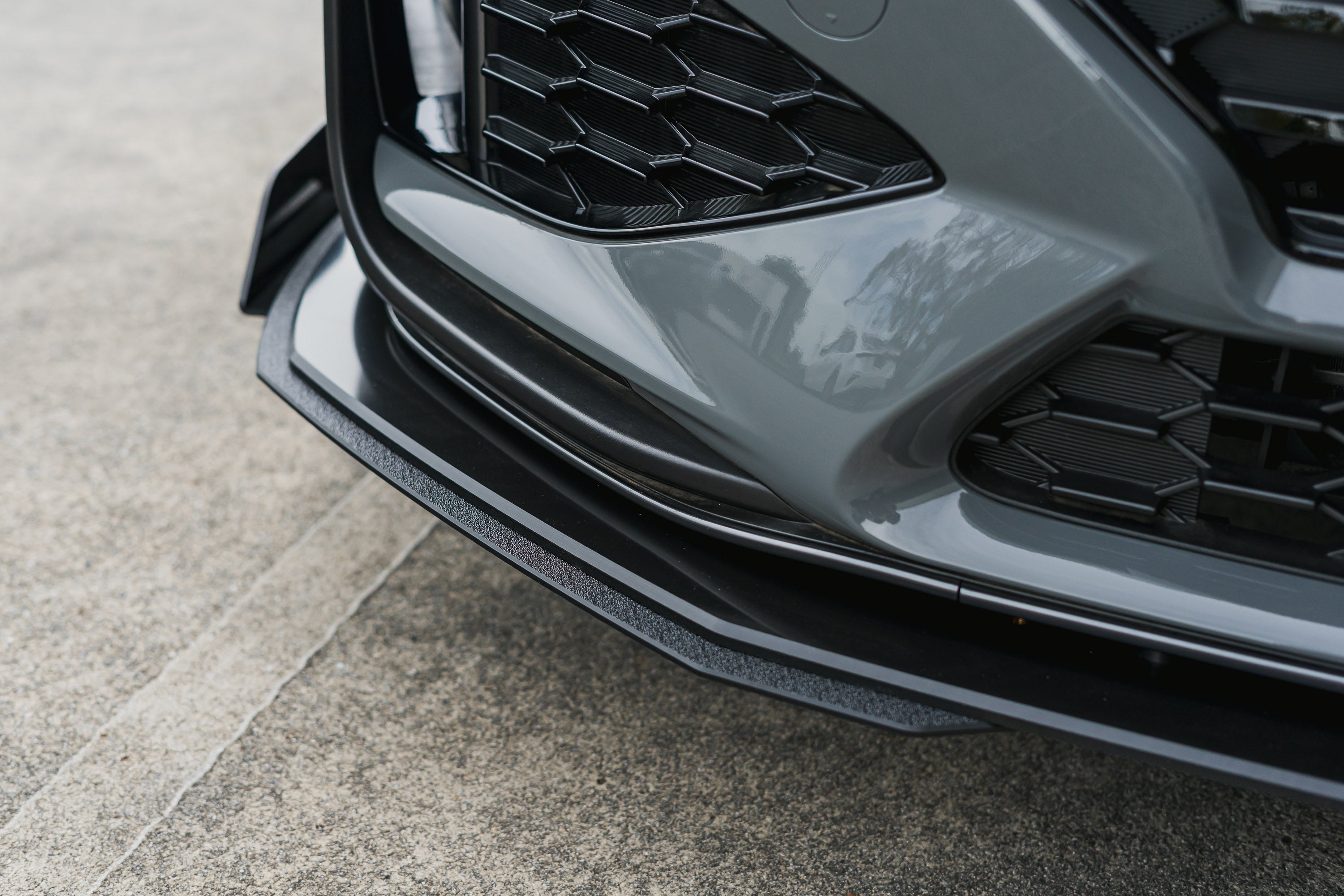 FLOW Designs  i30N-Line Hatch PDe.V6 FL 2024+ Front Lip Splitter & Reinforcement Brackets - MODE Auto Concepts