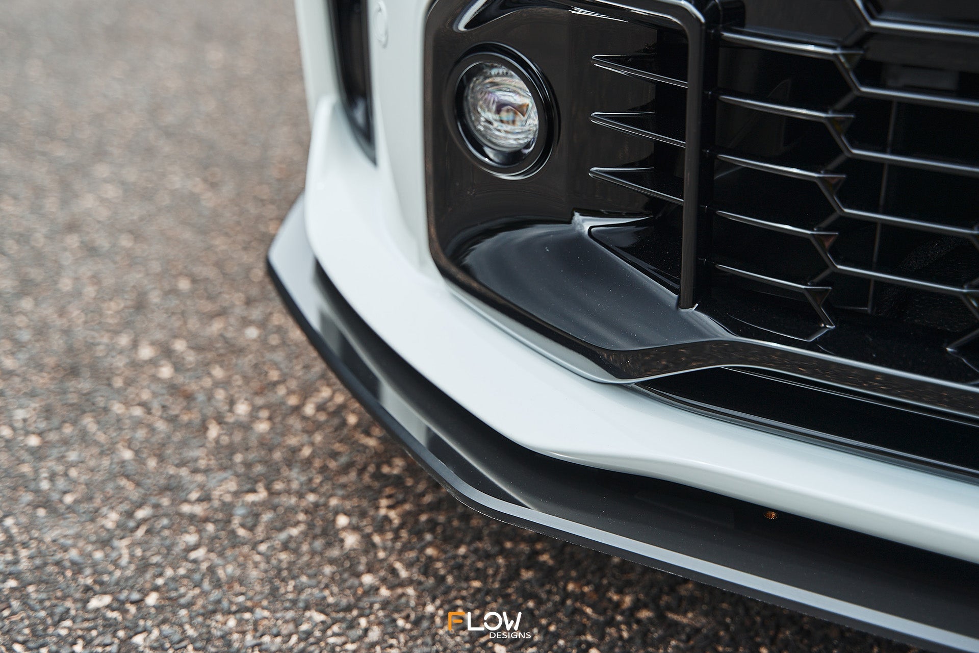 FLOW Designs  Corolla GR Chassis Mounted Front Lip Splitter (GLOSS) - MODE Auto Concepts